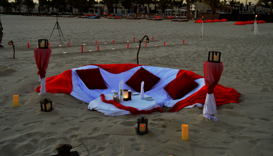Romantic Private Dining on White Sand Beach at Al Baleed Resort Salalah by Anantara